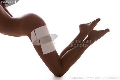 Image of long legs and naked back