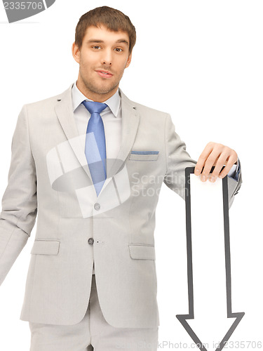 Image of businessman with direction arrow sign