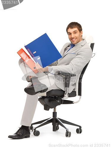 Image of man with folders