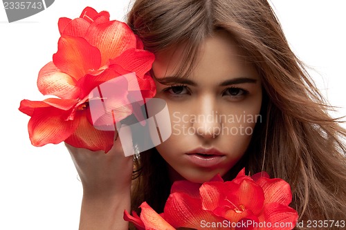 Image of lovely woman with red flowers