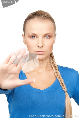 Image of woman making stop gesture