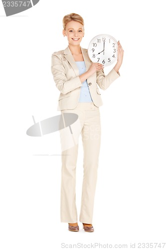 Image of woman holding big clock