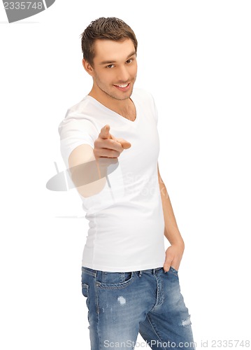 Image of man in white shirt pointing his finger