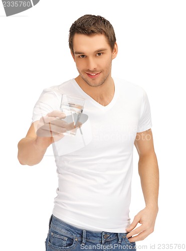 Image of man in white shirt with glass of water