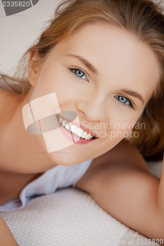 Image of happy and smiling teenage girl