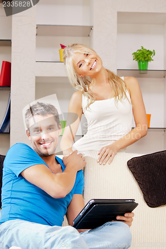 Image of happy couple at home