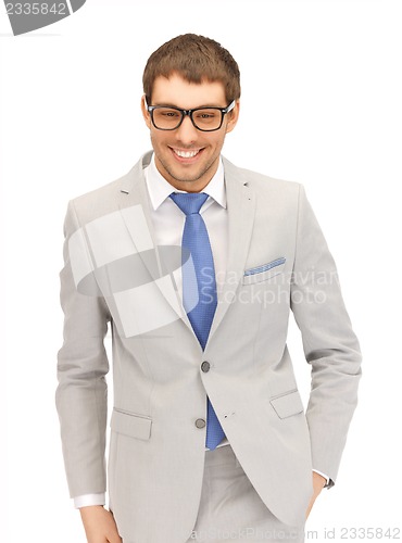Image of happy businessman in spectacles