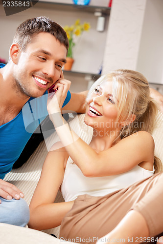 Image of happy couple at home