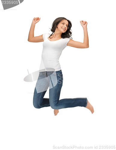 Image of jumping woman in blank white t-shirt