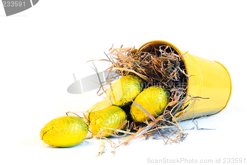 Image of yellow bucket with yellow easter eggs