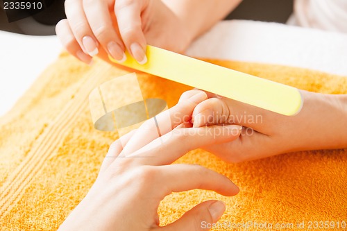 Image of manicure process on female hands