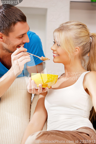 Image of happy couple at home