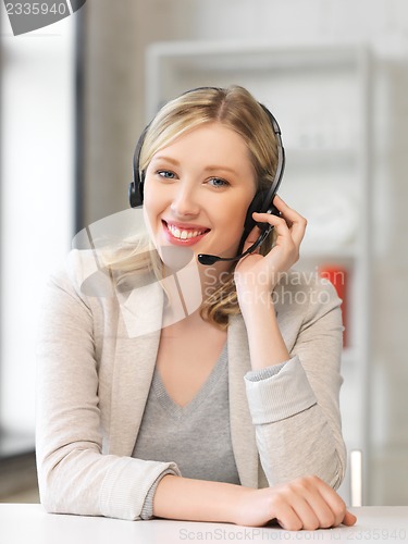 Image of friendly female helpline operator
