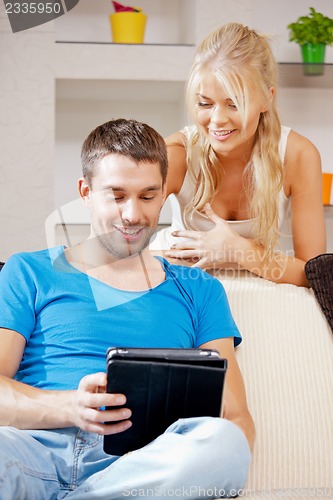 Image of happy couple at home