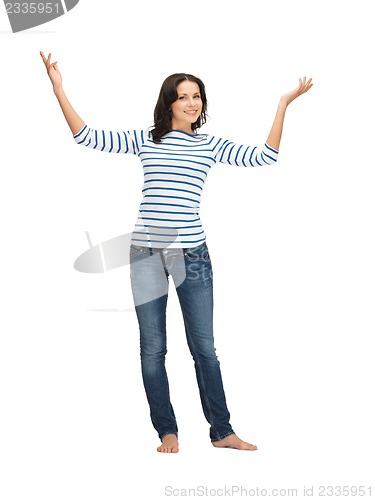 Image of woman in casual clothes showing direction