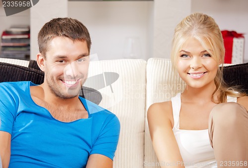 Image of happy couple at home