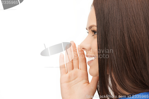 Image of woman whispering gossip