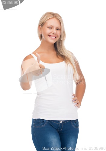 Image of teenage girl in blank white t-shirt with thumbs up