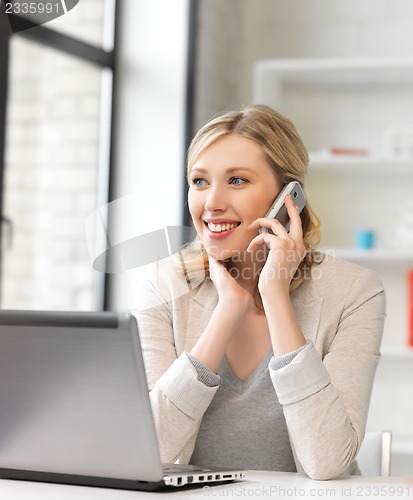 Image of businesswoman with cell phone