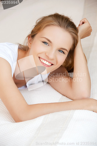 Image of happy and smiling teenage girl