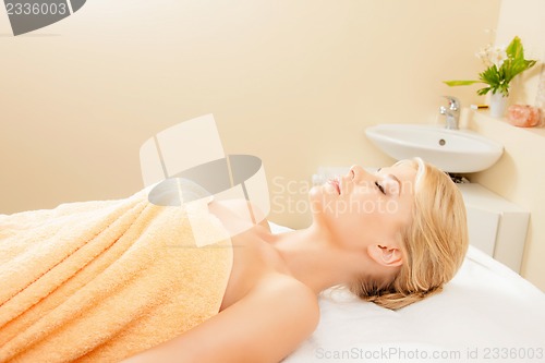 Image of beautiful woman in spa salon