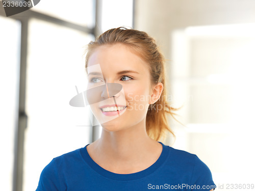 Image of happy and smiling teenage girl