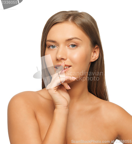 Image of woman with finger on lips