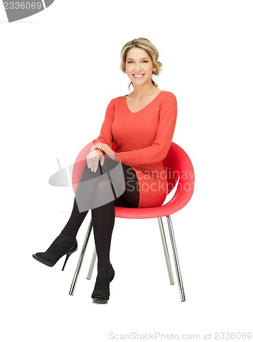 Image of businesswoman sitting in chair