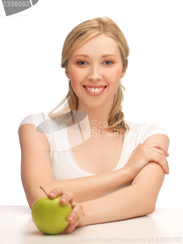 Image of woman with green apple