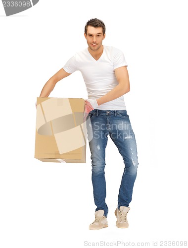 Image of handsome man with big box