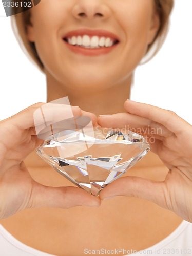 Image of smiling woman with big diamond