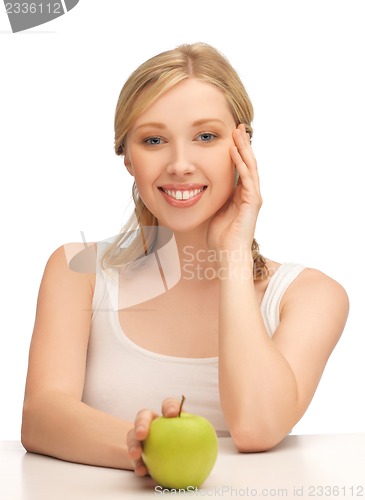 Image of woman with green apple