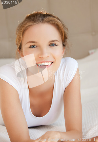 Image of happy and smiling teenage girl