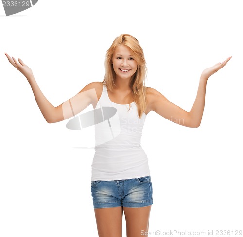 Image of smiling teenage girl in blank white t-shirt