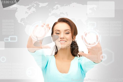 Image of businesswoman working with touch screen