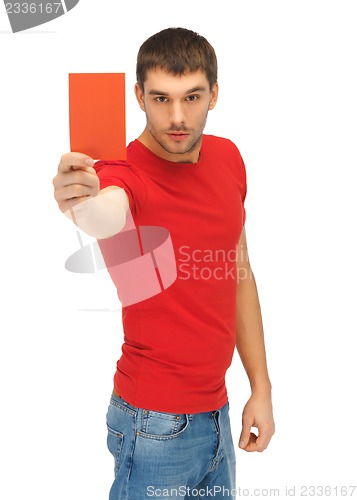 Image of handsome man with red card