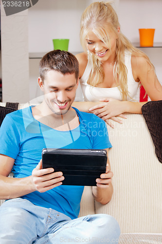 Image of happy couple at home
