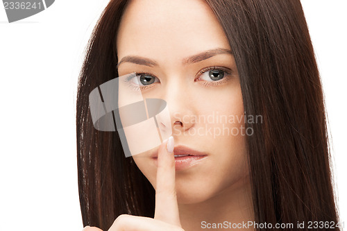 Image of picture of woman with finger on lips