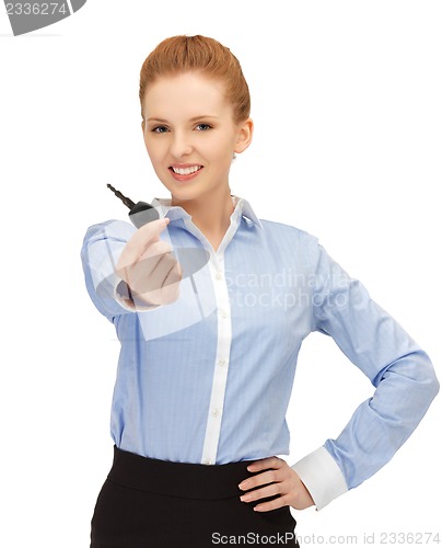 Image of happy woman with car key