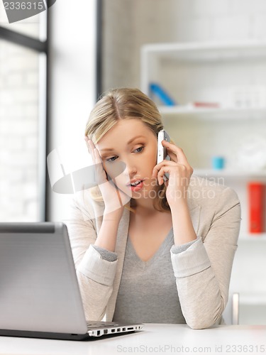 Image of businesswoman with cell phone