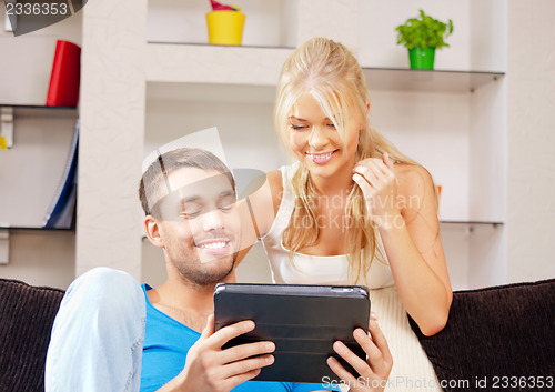 Image of happy couple at home