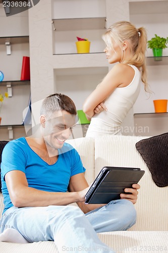 Image of couple with tablet PC