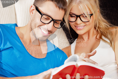 Image of happy couple at home