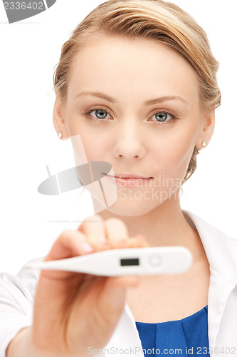 Image of attractive female doctor with thermometer