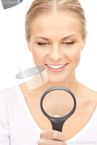 Image of woman with magnifying glass