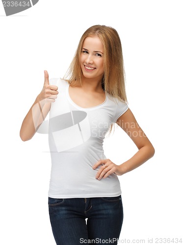 Image of teenage girl in blank white t-shirt with thumbs up