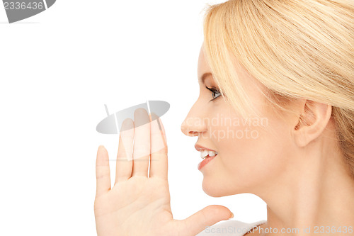 Image of woman whispering gossip