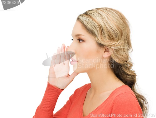 Image of woman whispering gossip