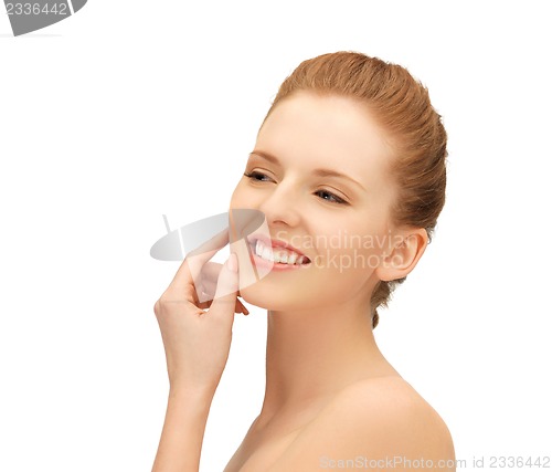 Image of face and hands of teenage girl