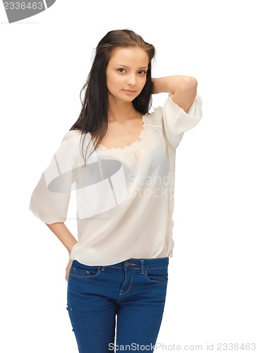 Image of beautiful woman in casual clothes